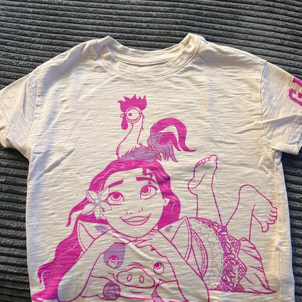 Disney x Gap Cream and Pink Moana and Hei Hei Graphic Tee.